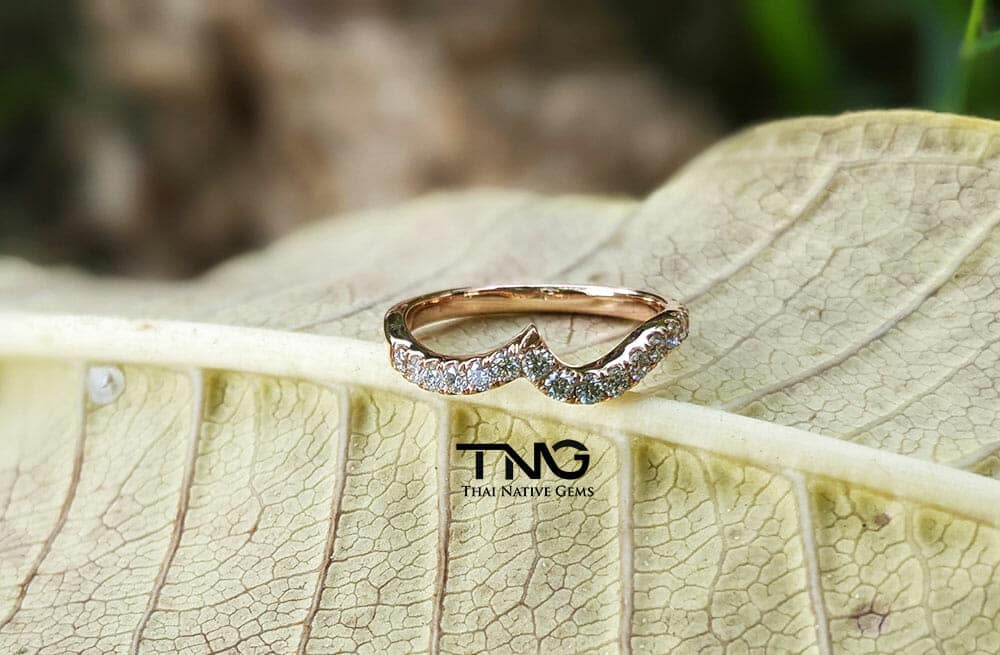 Custom made wedding ring and band from Bangkok, Thailand. Matching wedding band made for unique engagement ring in 18K Rose gold.